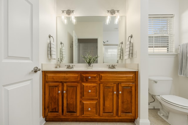 bathroom with walk in shower, a chandelier, toilet, vanity, and tile patterned flooring