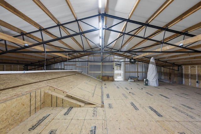 interior space featuring vaulted ceiling