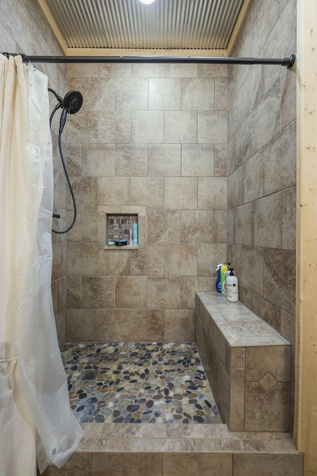 bathroom with a shower with shower curtain