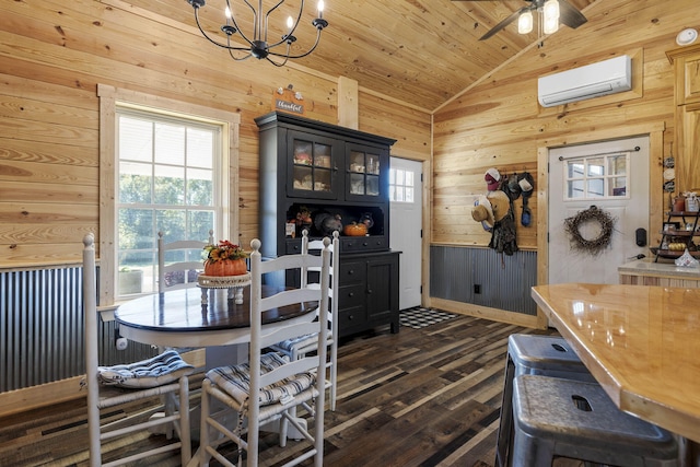 dining area with lofted ceiling, wood ceiling, dark hardwood / wood-style floors, an AC wall unit, and wooden walls