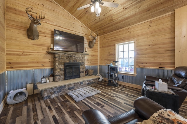 living room featuring wood walls, wood ceiling, a fireplace, high vaulted ceiling, and ceiling fan