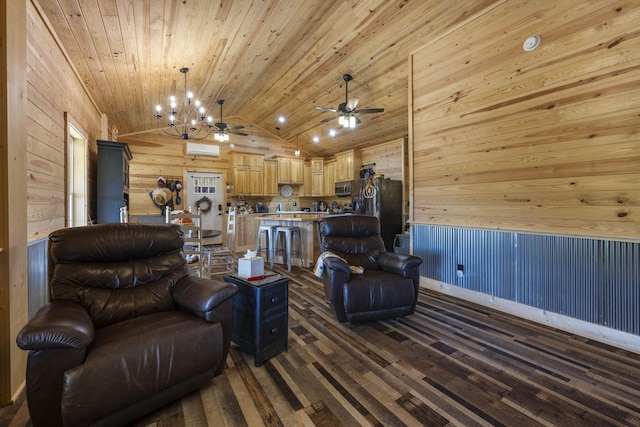 living room with wood walls, ceiling fan with notable chandelier, wood ceiling, dark hardwood / wood-style flooring, and vaulted ceiling