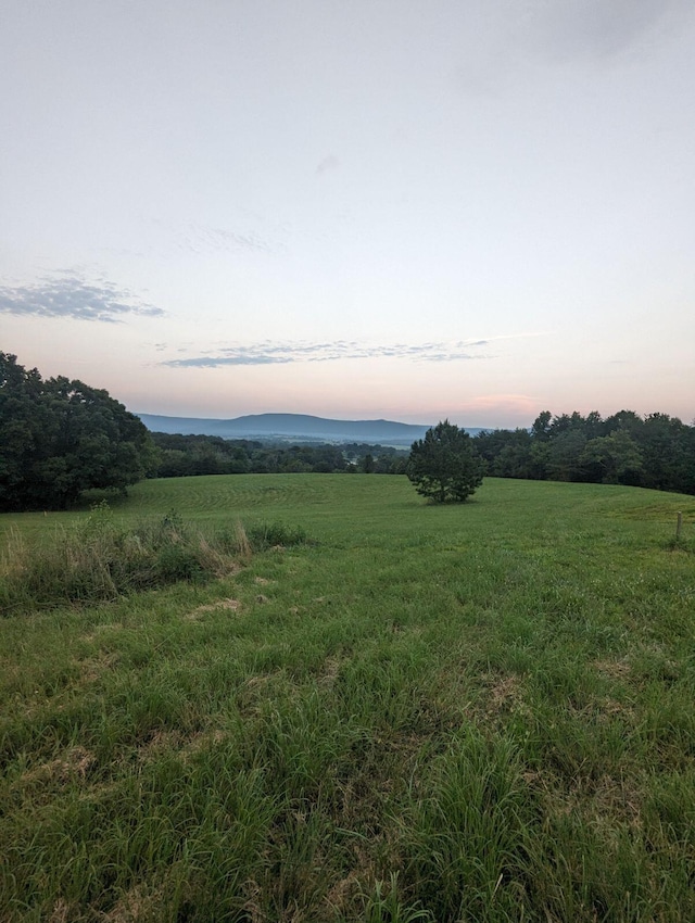 exterior space with a rural view