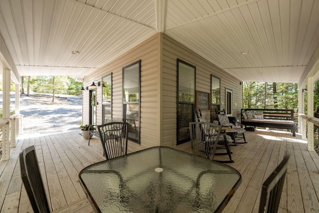 deck featuring covered porch