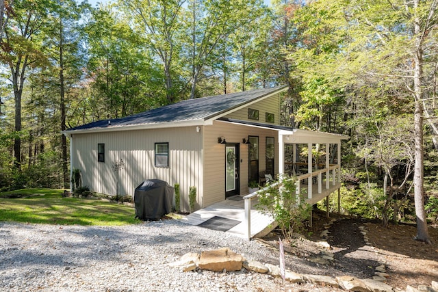 exterior space featuring metal roof