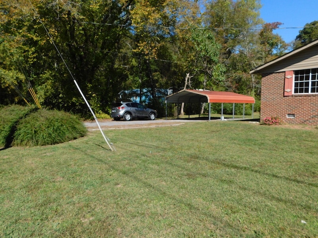 view of yard with a carport