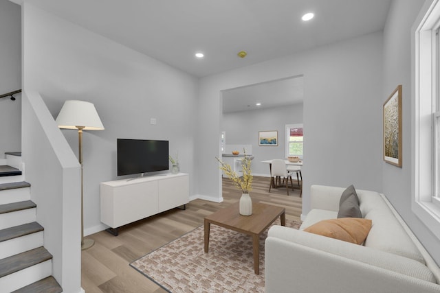 living room with light hardwood / wood-style floors