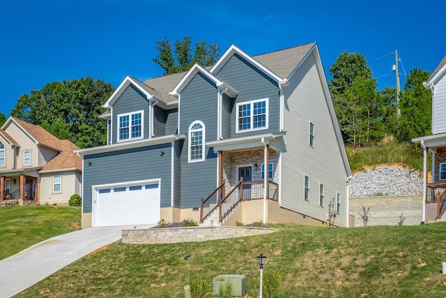 view of front of home with a garage, a front yard, and concrete driveway