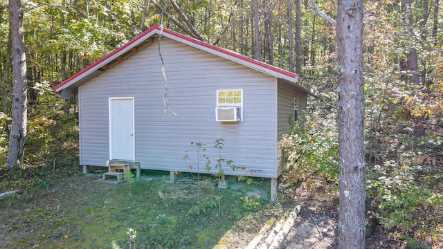 view of side of property with a yard