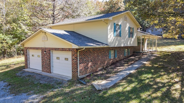 view of property exterior with a lawn and a garage