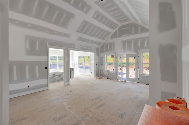 living room featuring vaulted ceiling