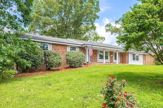 4011 Patton Edwards Dr, Chattanooga, TN 37412 - ranch-style home featuring brick siding and a front lawn