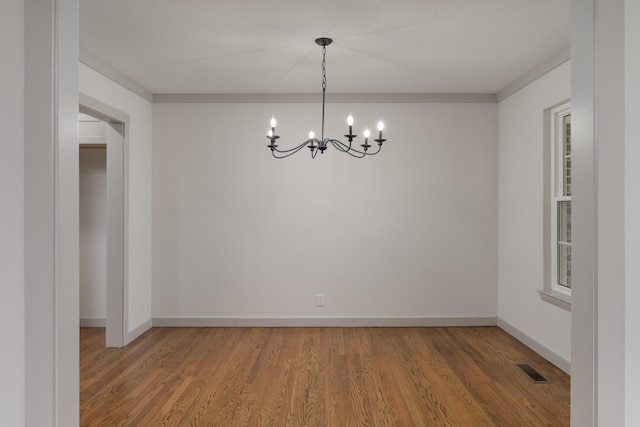 4011 Patton Edwards Dr, Chattanooga, TN 37412 - unfurnished room with a chandelier and wood finished floors