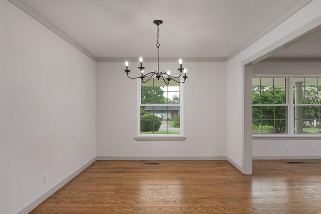 4011 Patton Edwards Dr, Chattanooga, TN 37412 - spare room featuring a chandelier and wood finished floors