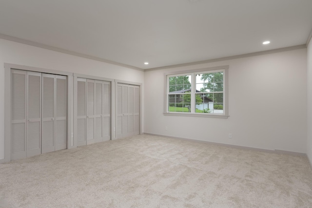 4011 Patton Edwards Dr, Chattanooga, TN 37412 - unfurnished bedroom featuring carpet floors, multiple closets, and recessed lighting