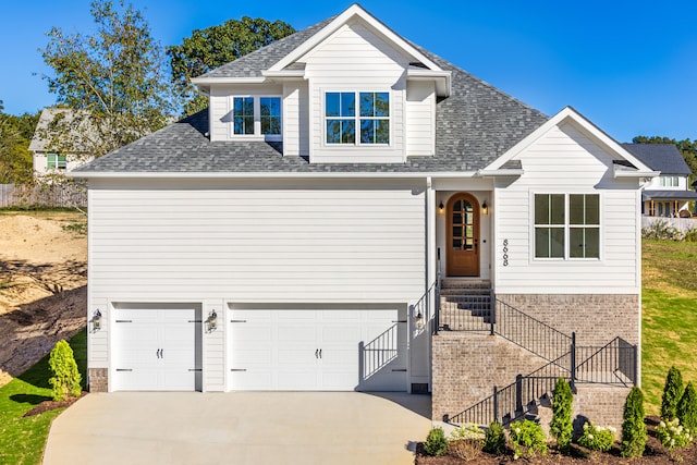 front of property with a garage