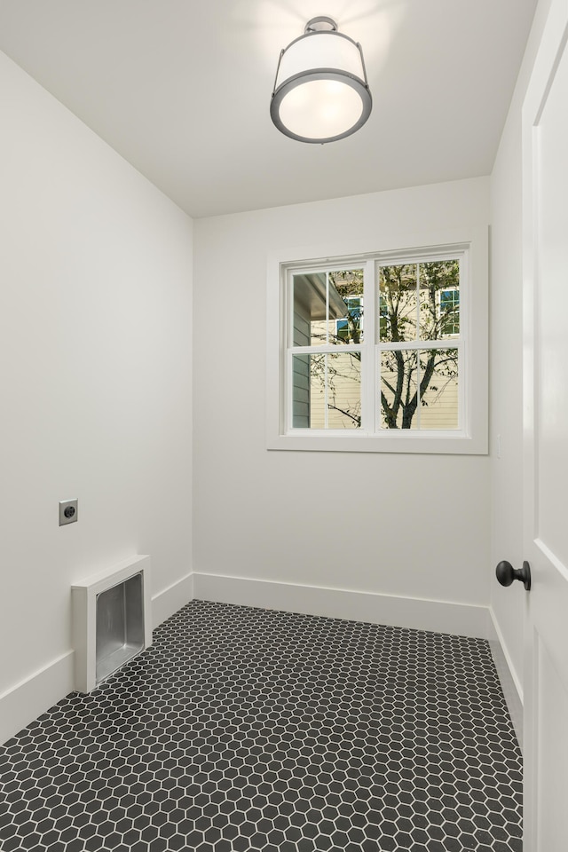 clothes washing area with hookup for an electric dryer