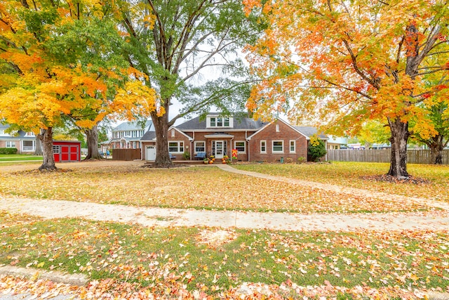 view of front of home featuring covered porch and a front lawn