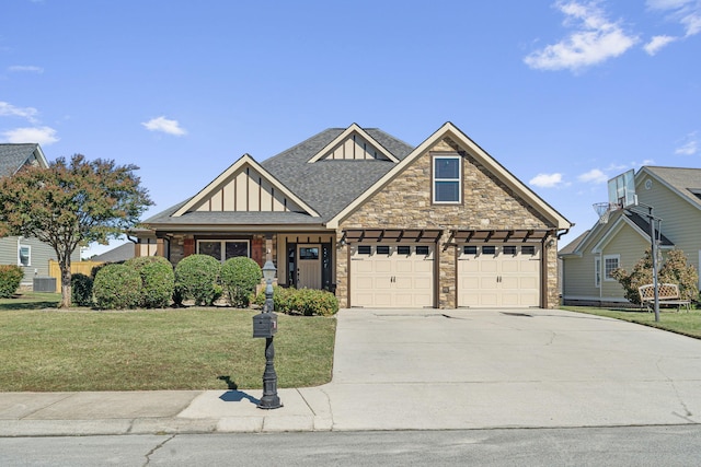 craftsman-style house with a front lawn and a garage