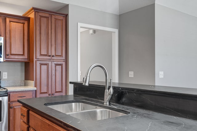 kitchen featuring stainless steel appliances and sink