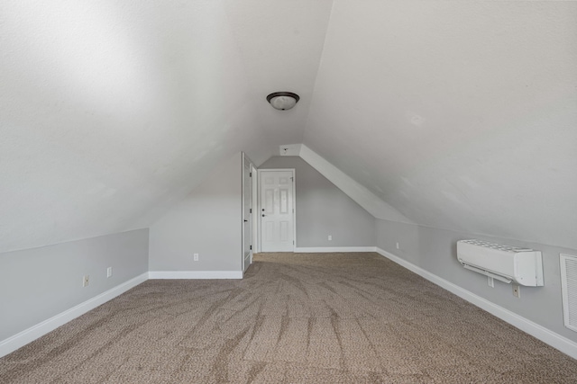 bonus room featuring vaulted ceiling and carpet flooring