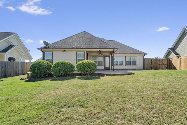 back of house with a patio, a lawn, and ceiling fan