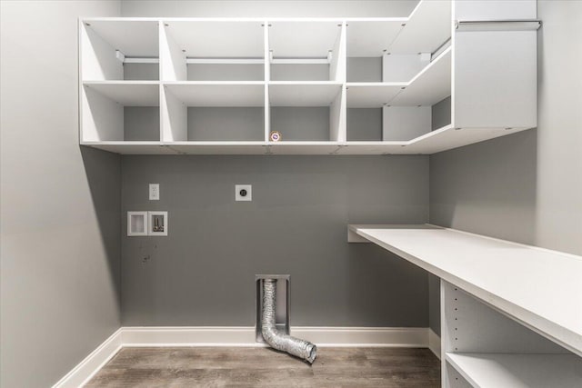 laundry area featuring electric dryer hookup, washer hookup, and hardwood / wood-style floors