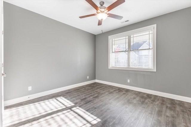 unfurnished room with hardwood / wood-style floors and ceiling fan