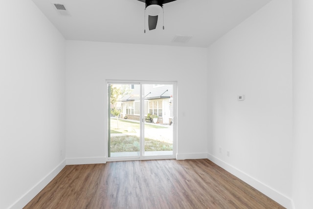 unfurnished room featuring wood-type flooring and ceiling fan