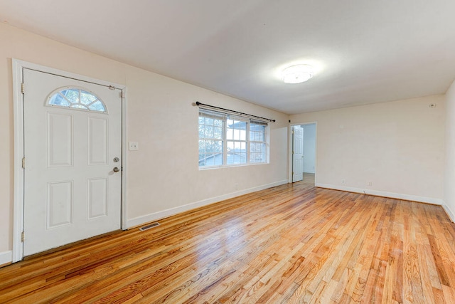 foyer with light hardwood / wood-style flooring