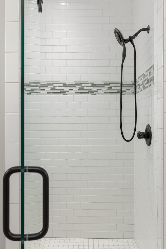 bathroom with a stall shower