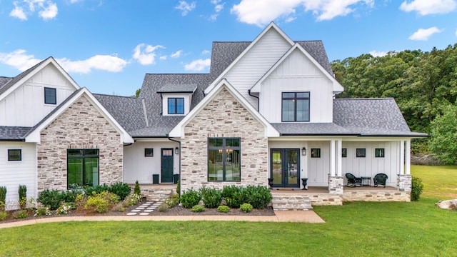 modern farmhouse style home with a front yard