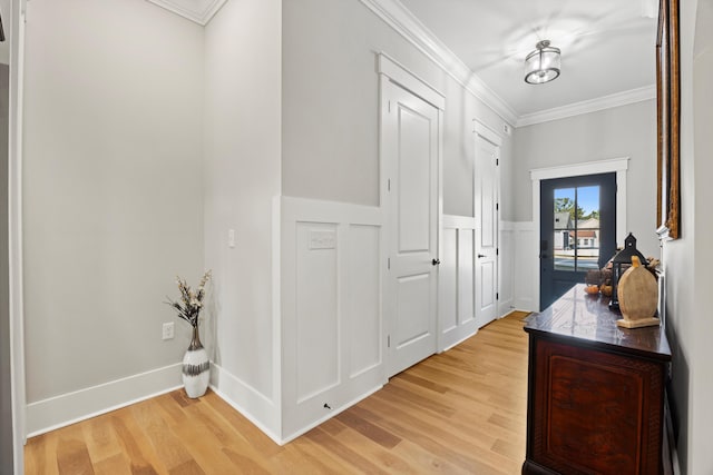 interior space featuring light hardwood / wood-style flooring and ornamental molding