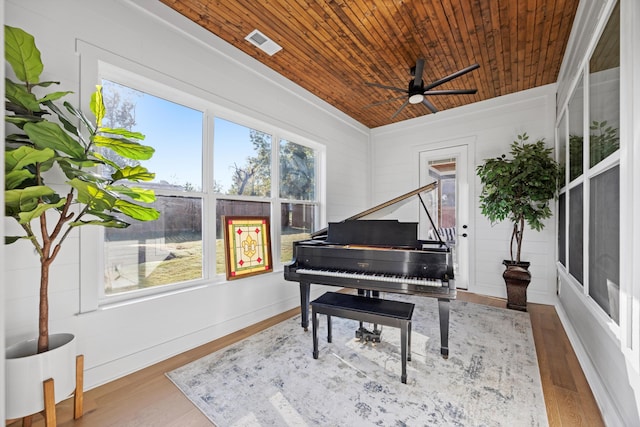 miscellaneous room with hardwood / wood-style flooring, ceiling fan, and wooden ceiling