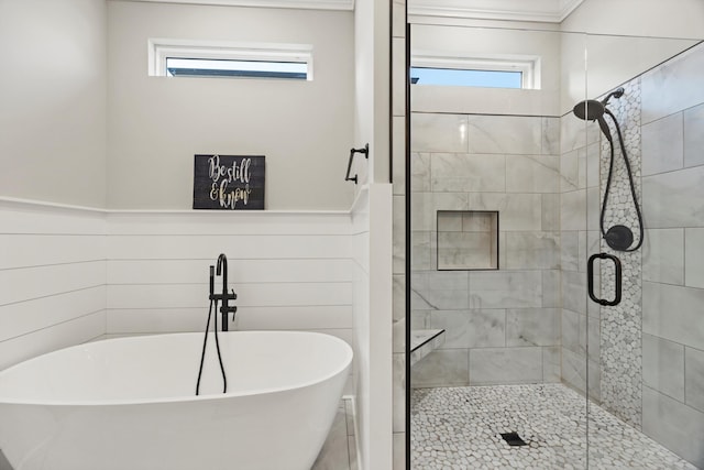 bathroom with plus walk in shower and a wealth of natural light