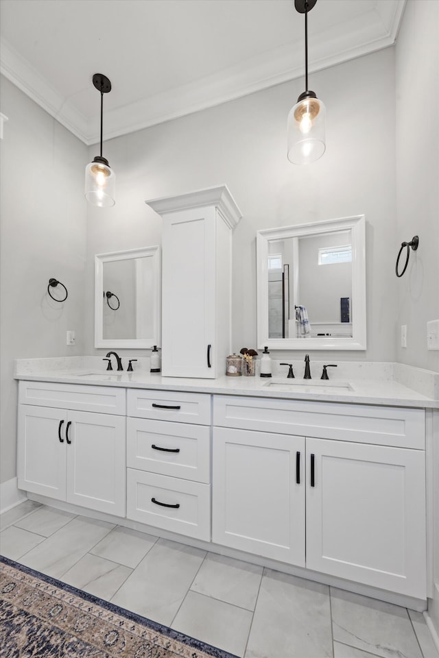 bathroom with vanity and crown molding