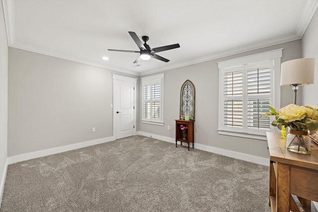 unfurnished bedroom with crown molding, ceiling fan, and carpet floors