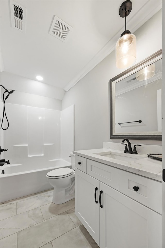 full bathroom featuring crown molding, bathtub / shower combination, vanity, and toilet