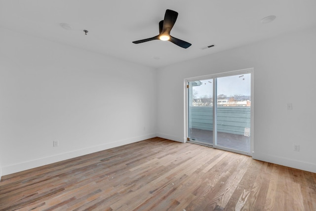 unfurnished room featuring ceiling fan and light hardwood / wood-style flooring