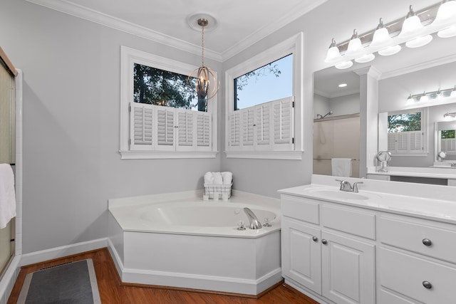 bathroom with hardwood / wood-style floors, plenty of natural light, shower with separate bathtub, and crown molding