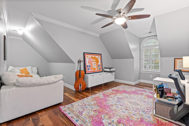 interior space featuring ceiling fan, dark wood-type flooring, vaulted ceiling, and ornamental molding