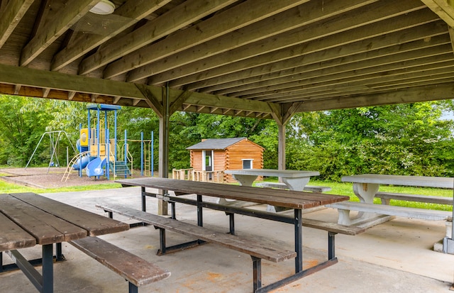 view of patio / terrace with a shed