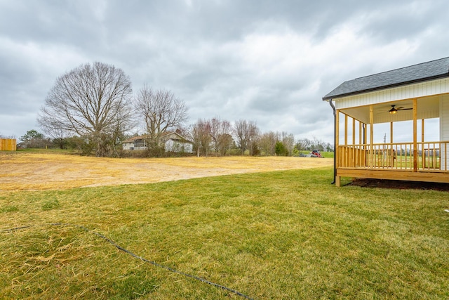 view of yard with ceiling fan