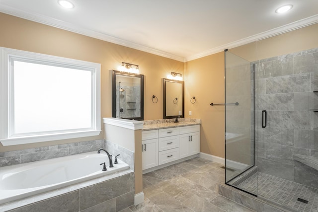 bathroom with a garden tub, ornamental molding, a shower stall, vanity, and baseboards