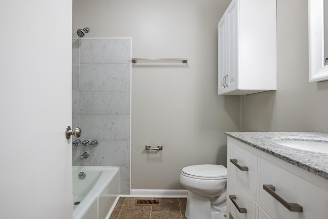 full bathroom featuring vanity, toilet, tile patterned flooring, and tiled shower / bath