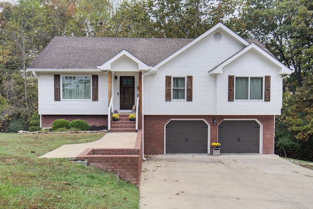 view of front facade with a garage, concrete driveway, a shingled roof, and a front yard
