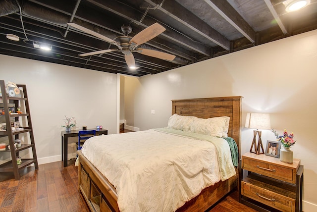 bedroom with dark wood-style floors