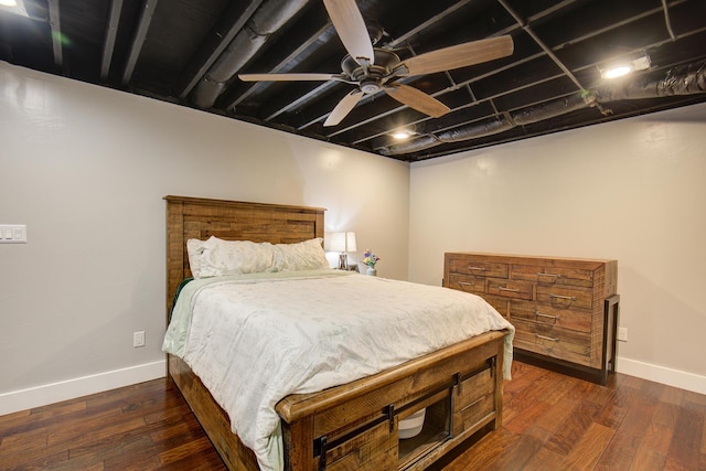 bedroom featuring baseboards, dark wood-style flooring, and ceiling fan