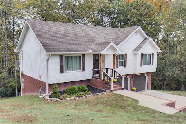 view of front of home with a shingled roof, a front yard, and an attached garage