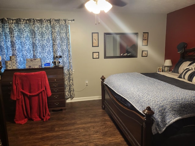 bedroom featuring ceiling fan and dark hardwood / wood-style floors